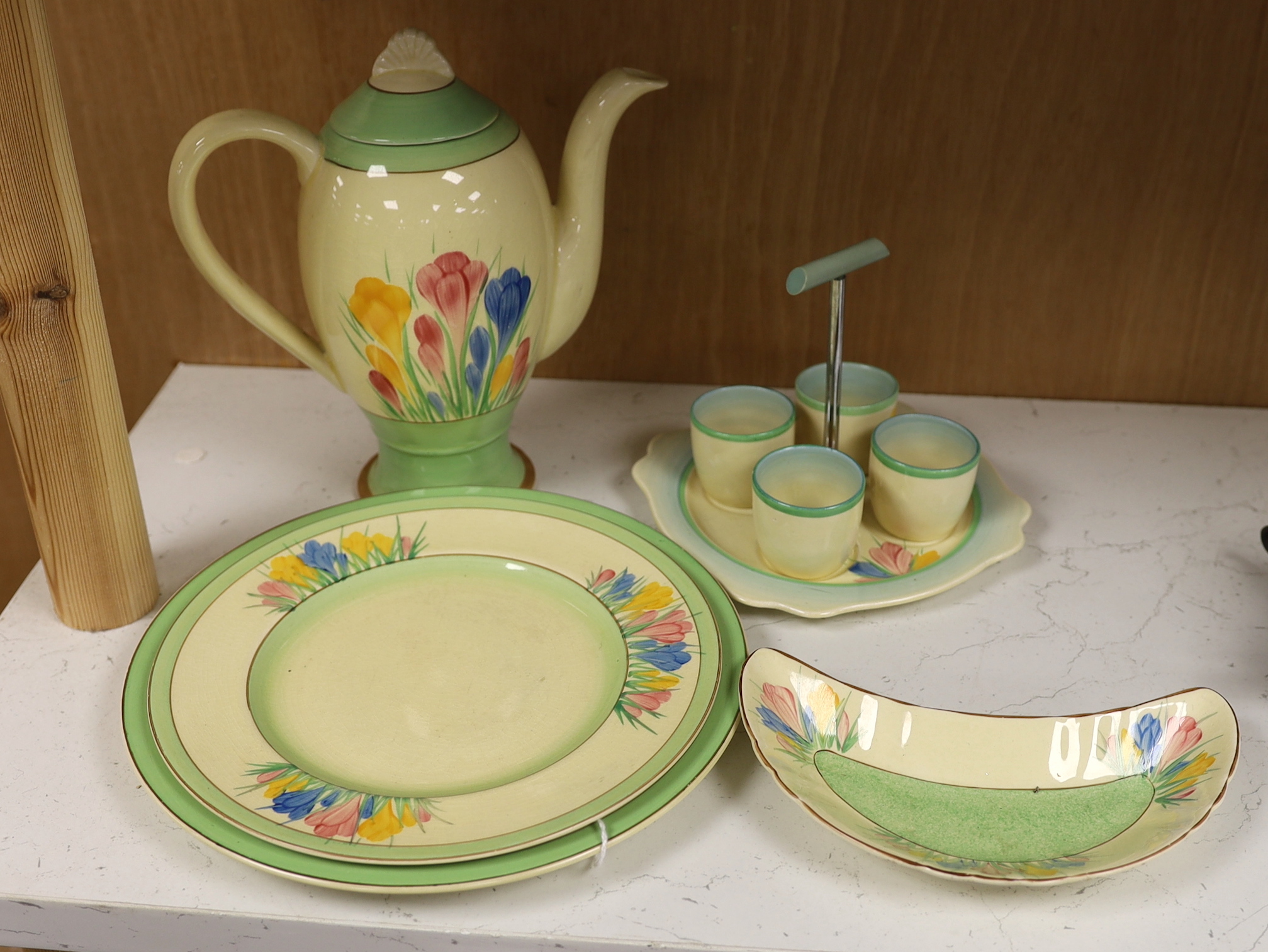 A Clarice Cliff 'Spring Crocus' pattern teapot, plates etc (5)